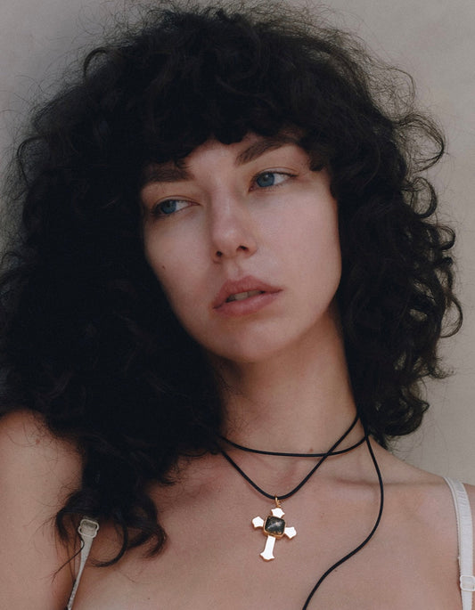 Cross on cord