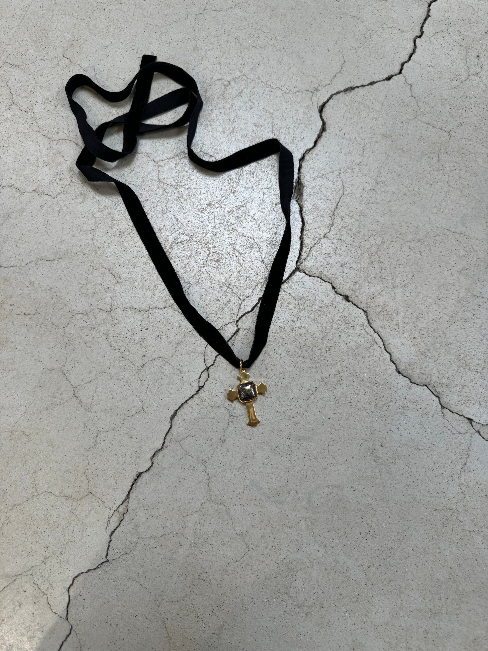 Cross on cord